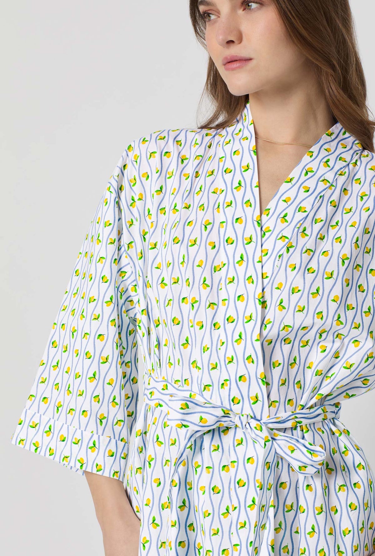 A closeup of A lady wearing White Woven Cotton Poplin Kimono Robe