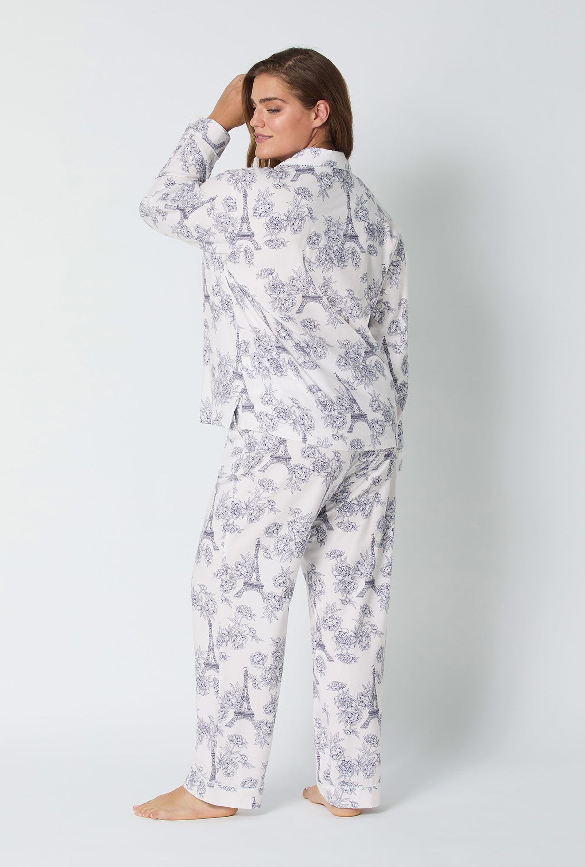 A lady wearing La Belle Eiffel Long Sleeve Classic Woven Portuguese Flannel PJ Set