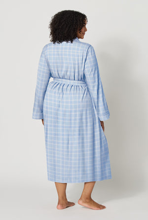 A lady wearing plus size Meadow Haze Plaid Unisex Classic Woven Portuguese Flannel Robe De Chambre back viwe