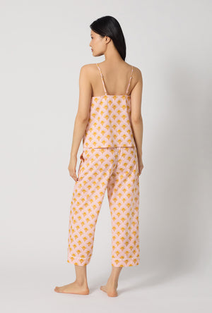 A Lady Wearing Deco Sunset Cami Woven Cotton Poplin Cropped Pj Set posing in a back view look