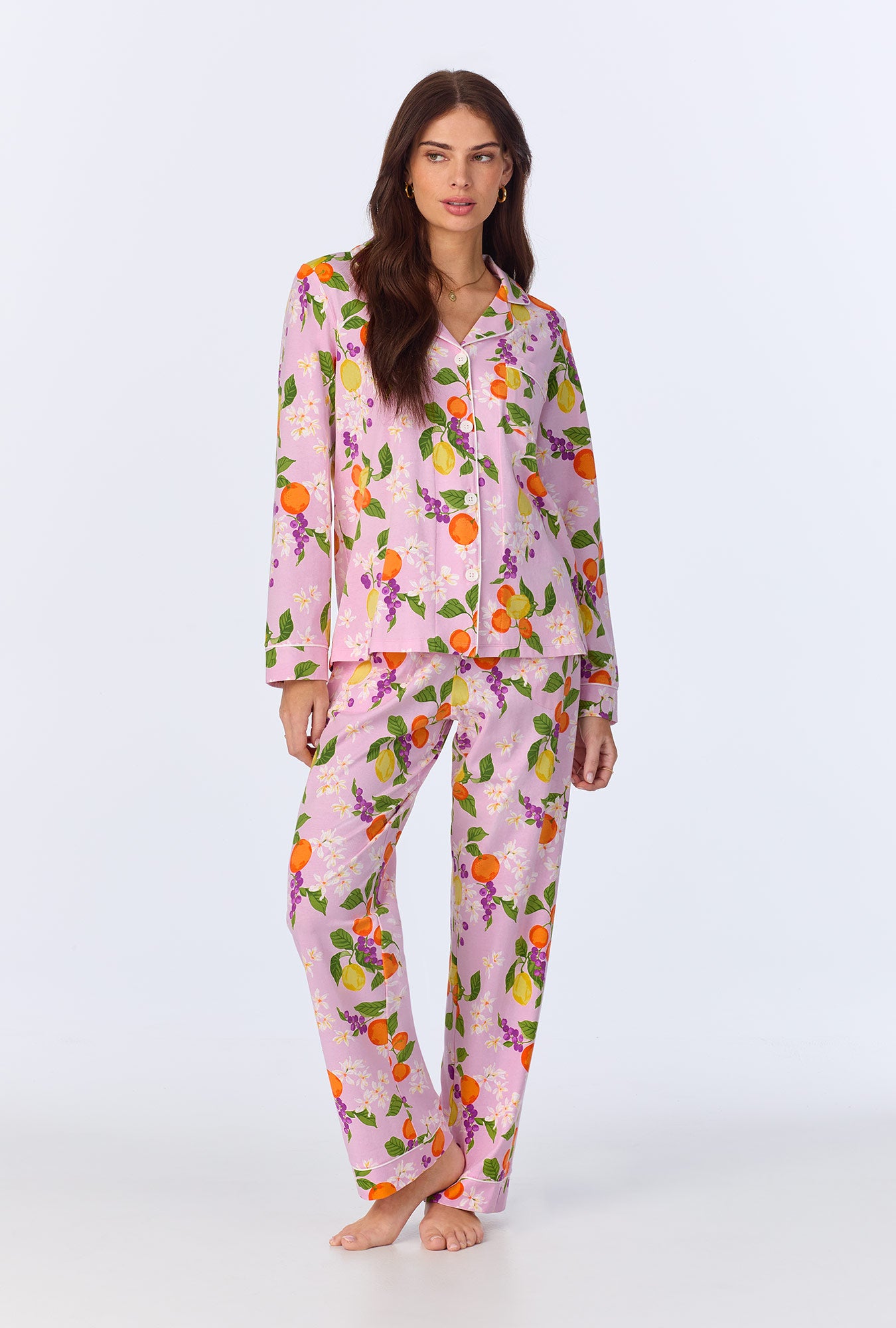 A lady wearing Citrus Blossom Long Sleeve Classic Stretch Jersey PJ set