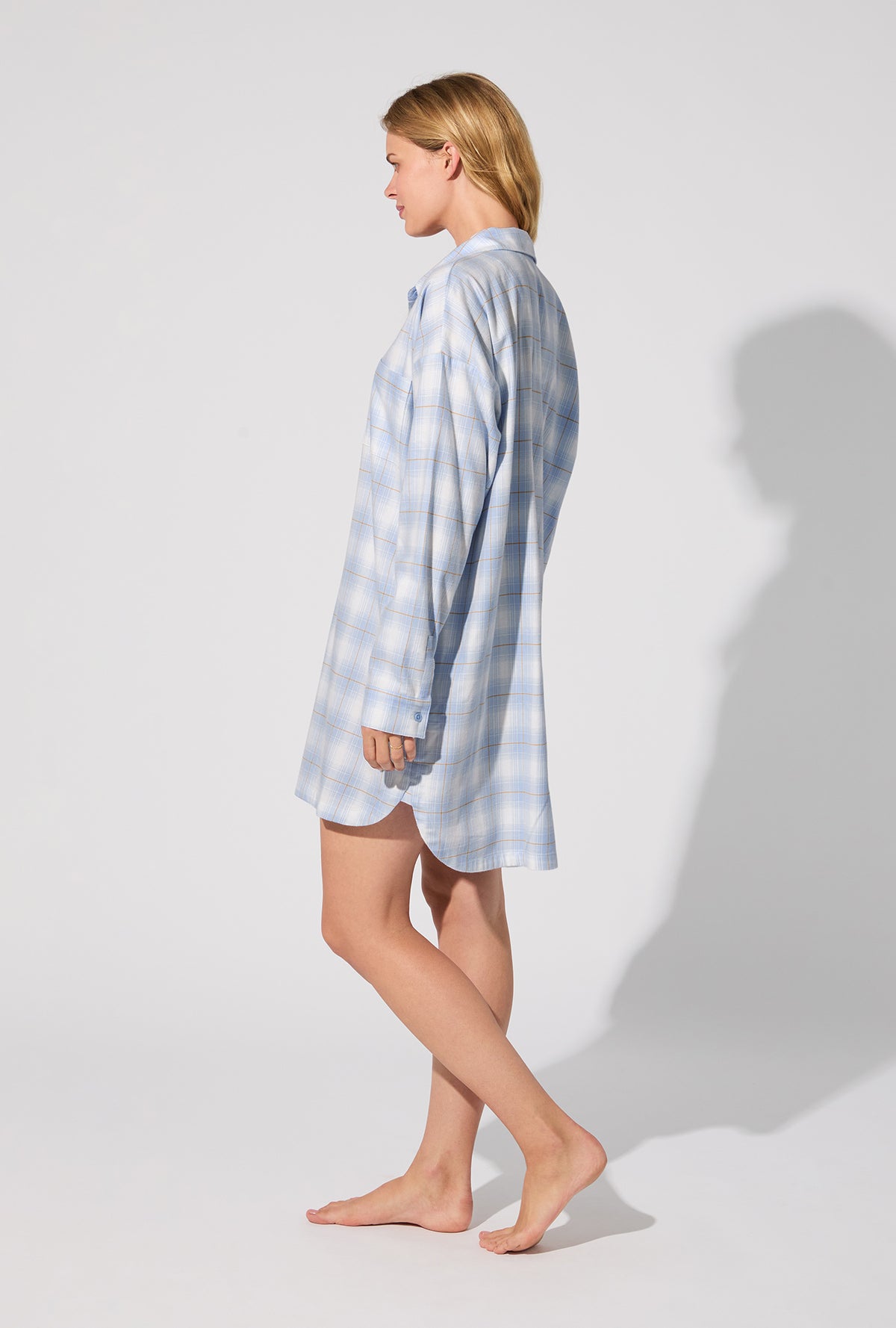 A lady wearing Blue Mountain Plaid High Low Woven Portuguese Flannel Boyfriend Shirt