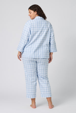 A lady wearing plus size Meadow Haze Plaid 3/4 Sleeve Classic Woven Portuguese Flannel Cropped Pj Set back view