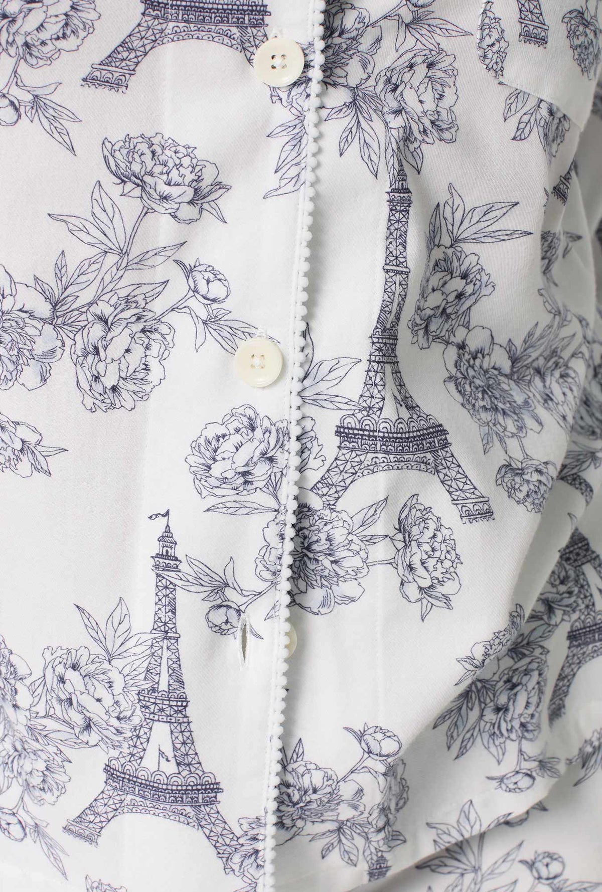 A lady wearing La Belle Eiffel Long Sleeve Classic Shorty Woven Portuguese Flannel PJ Set