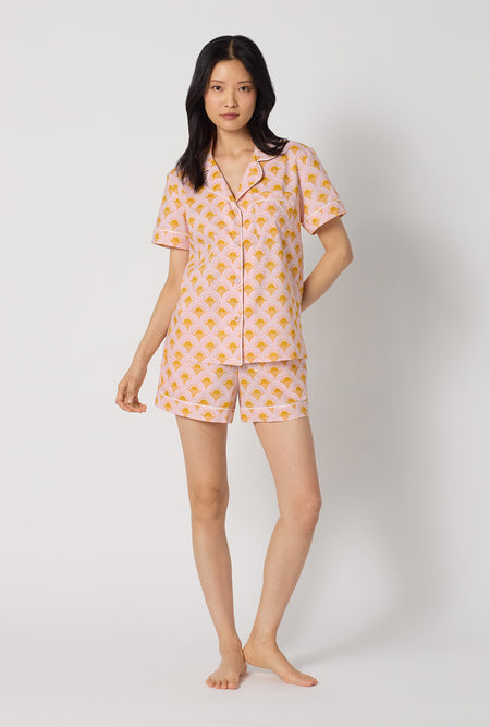 A Lady Wearing Deco Sunset Short Sleeve Classic Woven Cotton Poplin Shorty Pj Set