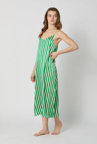 A lady wearing Green and  White Woven Washable Silk Chemise side view