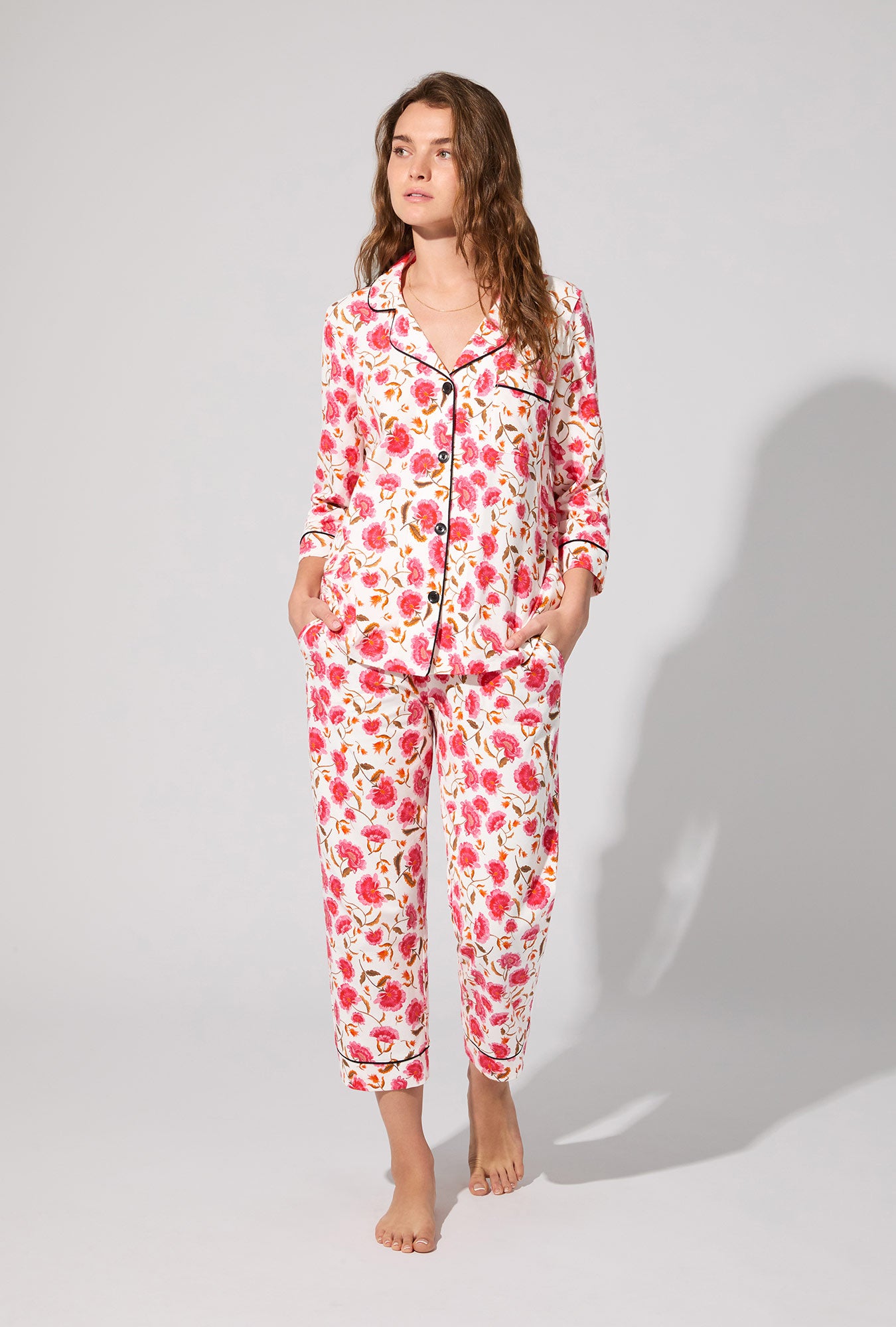 A lady wearing Fantasia Floral 3/4 Sleeve Classic Stretch Jersey Cropped PJ Set
