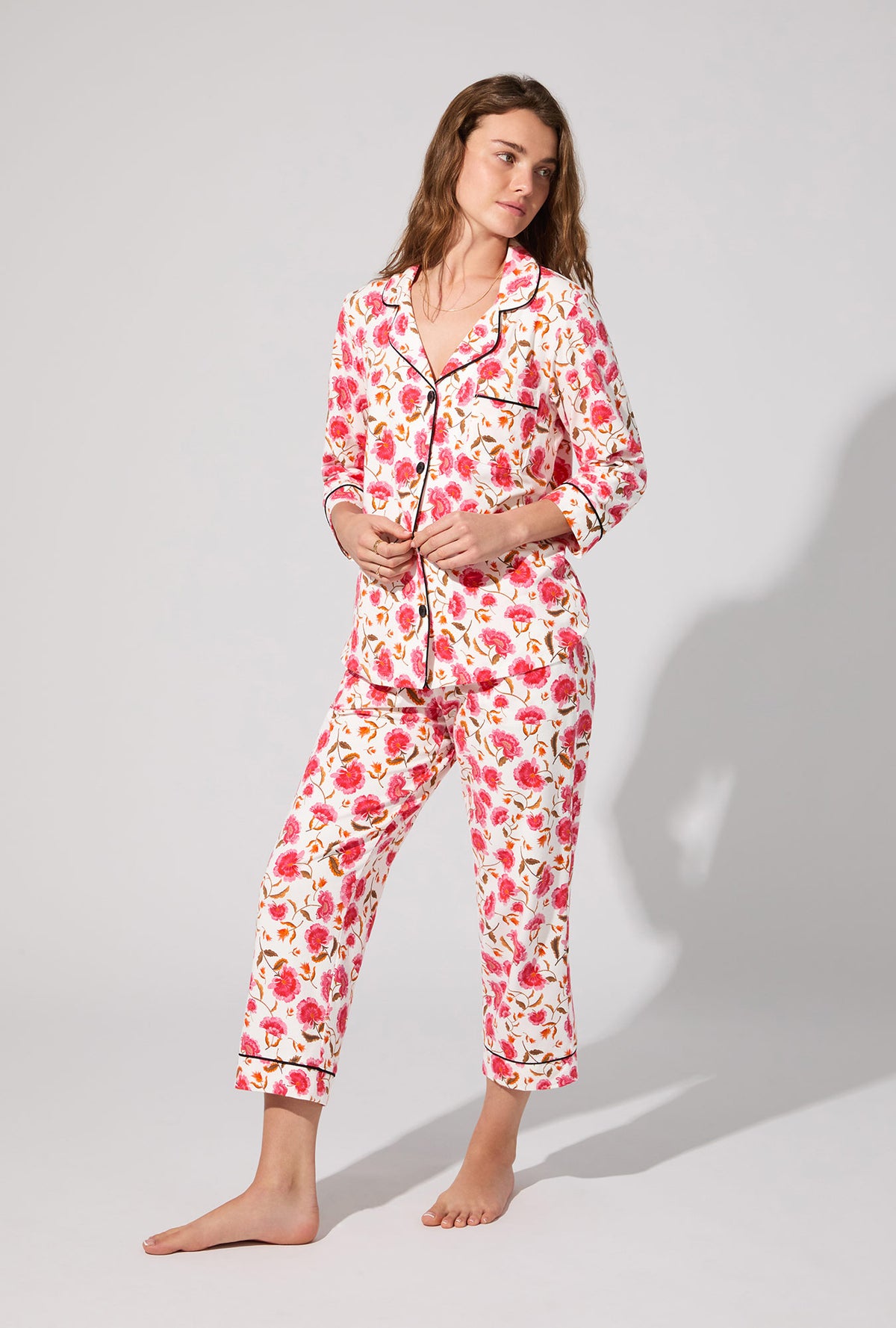 A lady wearing Fantasia Floral 3/4 Sleeve Classic Stretch Jersey Cropped PJ Set