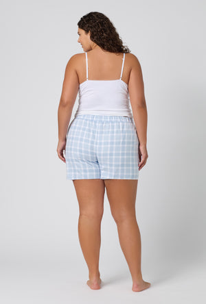 A lady wearing plus size Meadow Haze Plaid Woven Portuguese Flannel Boxer Short back view