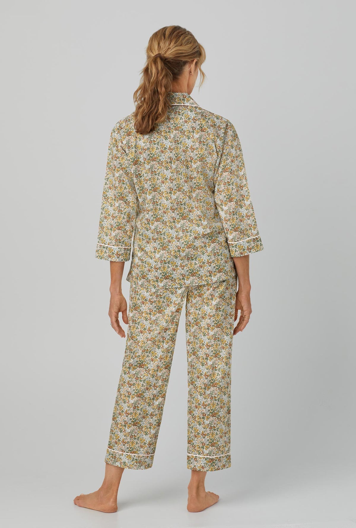 A lady wearing green 3/4 Sleeve Classic Woven Cotton Cropped PJ Set with Penstemon print