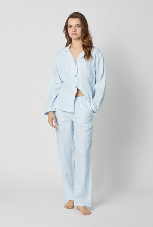 A lady wearing Baby's Breath Blue Long Sleeve Classic Woven Linen Pj Set front view