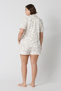 A lady wearing plus size Hundred Acre Toile Short Sleeve Classic Shorty Stretch Jersey Pj Set back view