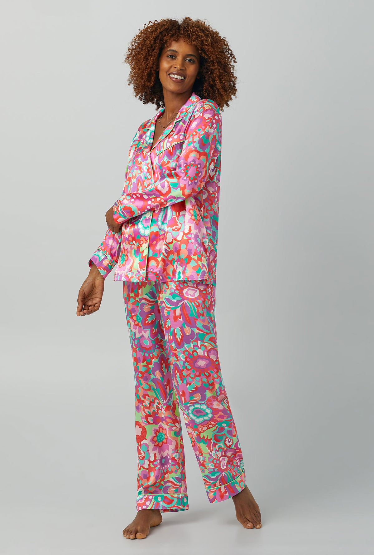 A lady wearing Long Sleeve Classic Washable Silk PJ Set with summer floral print