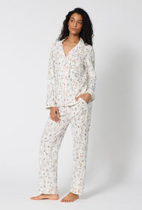 A lady wearing Hundred Acre Toile Long Sleeve Classic Stretch Jersey Pj Set looking side