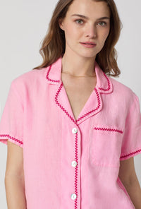 A closeup of A lady wearing Pink Short Sleeve Classic Shorty Woven Linen Pj Set