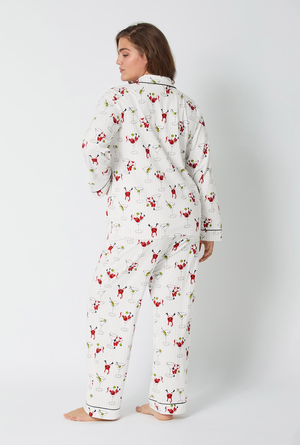 A lady wearing Tipsy Santa Long Sleeve Classic Stretch Jersey Pj Set