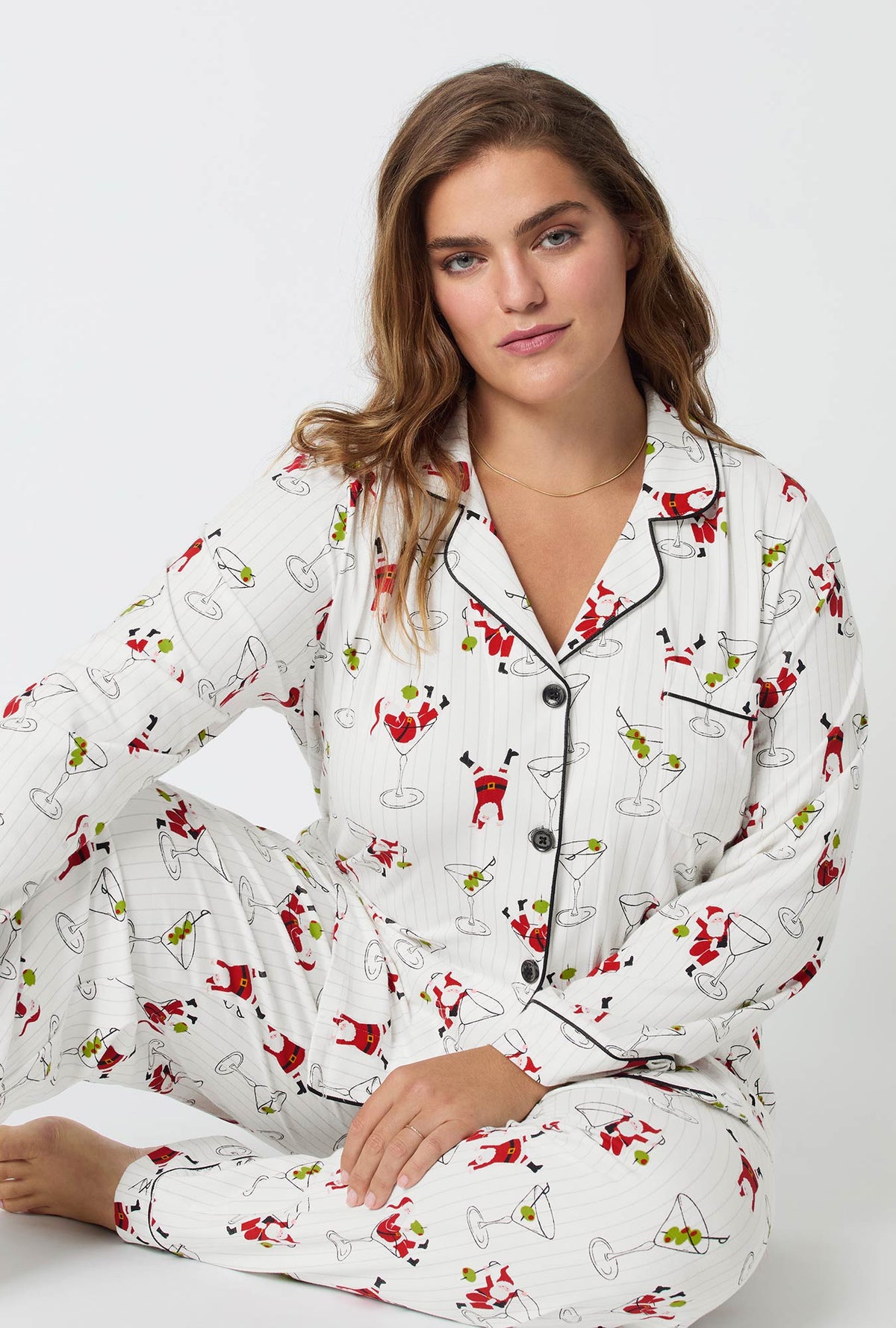 A lady wearing Tipsy Santa Long Sleeve Classic Stretch Jersey Pj Set