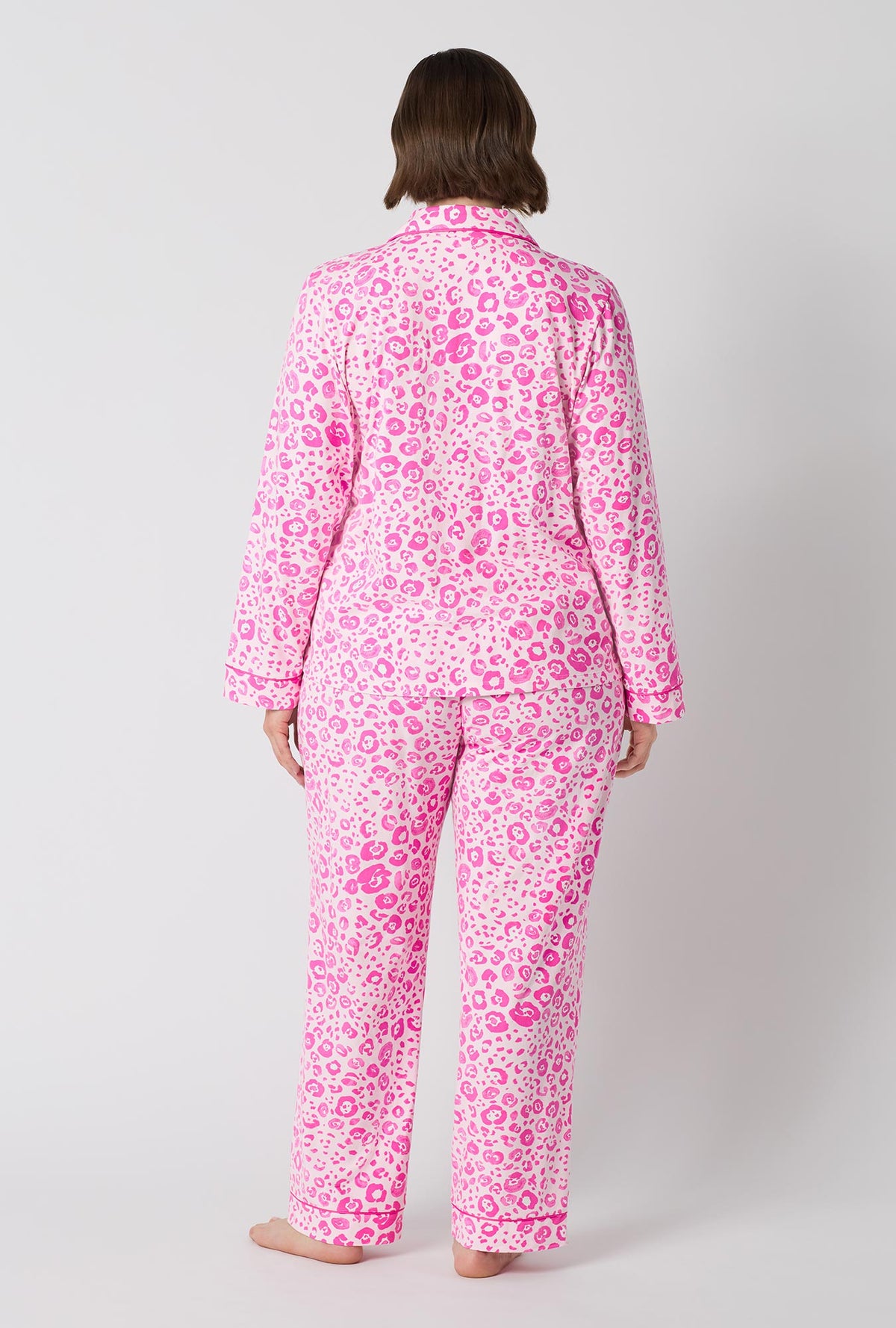 A Lady Wearing Plus Size Valentina Leopard Long Sleeve Classic Stretch Jersey Pj Set in a back view pose