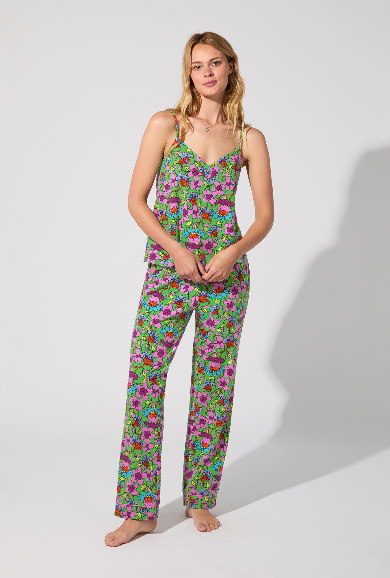 A lady wearing BedHead X Trina Turk Garden Floral Cami Tank Stretch Jersey Long PJ Set