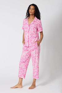 A Lady Wearing Valentina Leopard Short Sleeve Classic Stretch Jersey Cropped Pj Set in a side angled pose