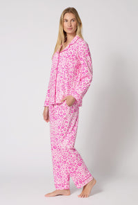 A Lady Wearing Valentina Leopard Long Sleeve Classic Stretch Jersey Pj Set in a side view pose