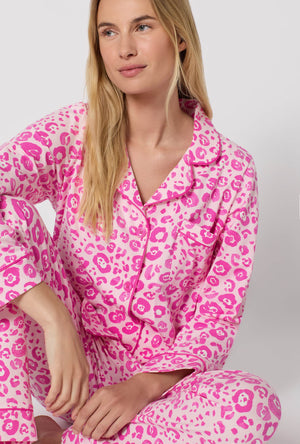 A Lady Wearing Valentina Leopard Long Sleeve Classic Stretch Jersey Pj Set in a close up view sitting pose
