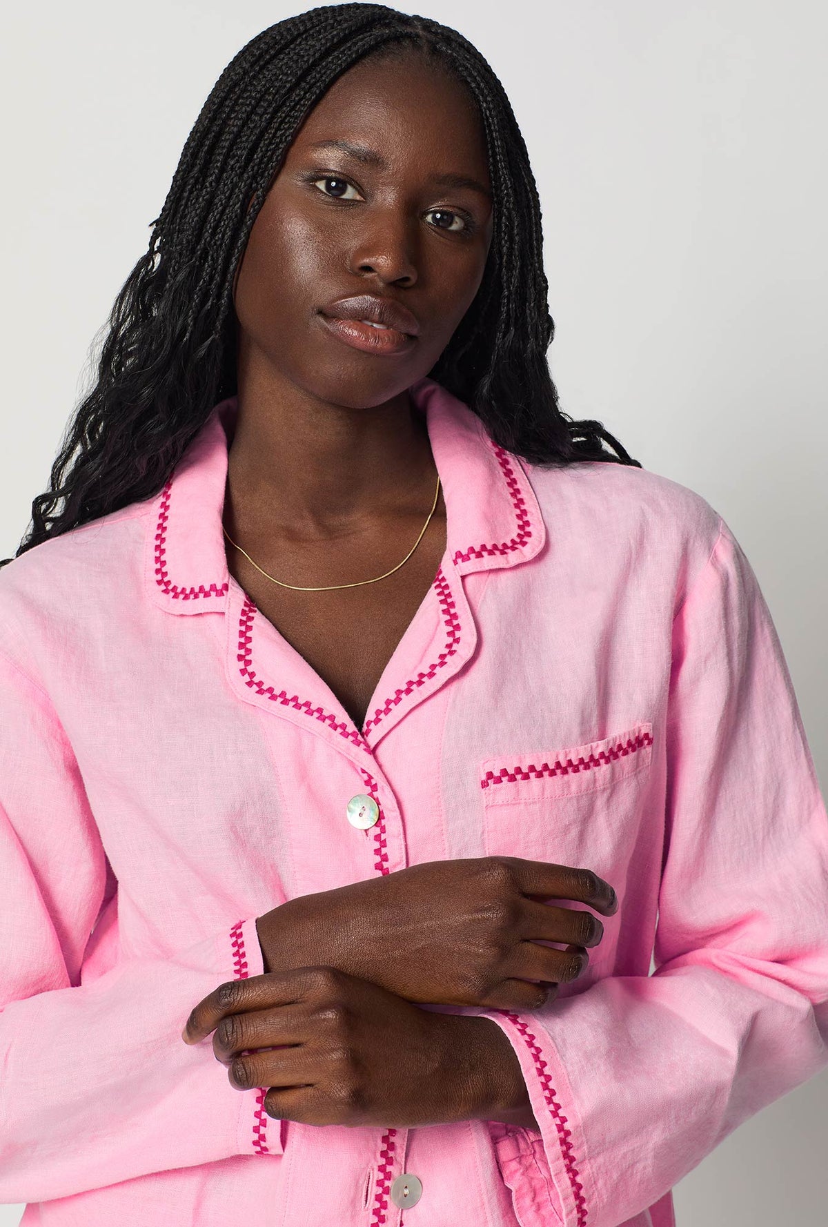 A closeup of A lady wearing Pink Long Sleeve Classic Woven Linen Pj Set