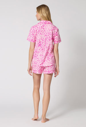 A Lady Wearing Valentina Leopard Short Sleeve Classic Shorty Stretch Jersey Pj Set in a back view pose