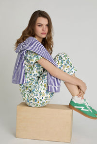 A closeup of A lady wearing White Short Sleeve Classic Woven Tana Lawn® Cropped Pj Set Made With Liberty Fabric