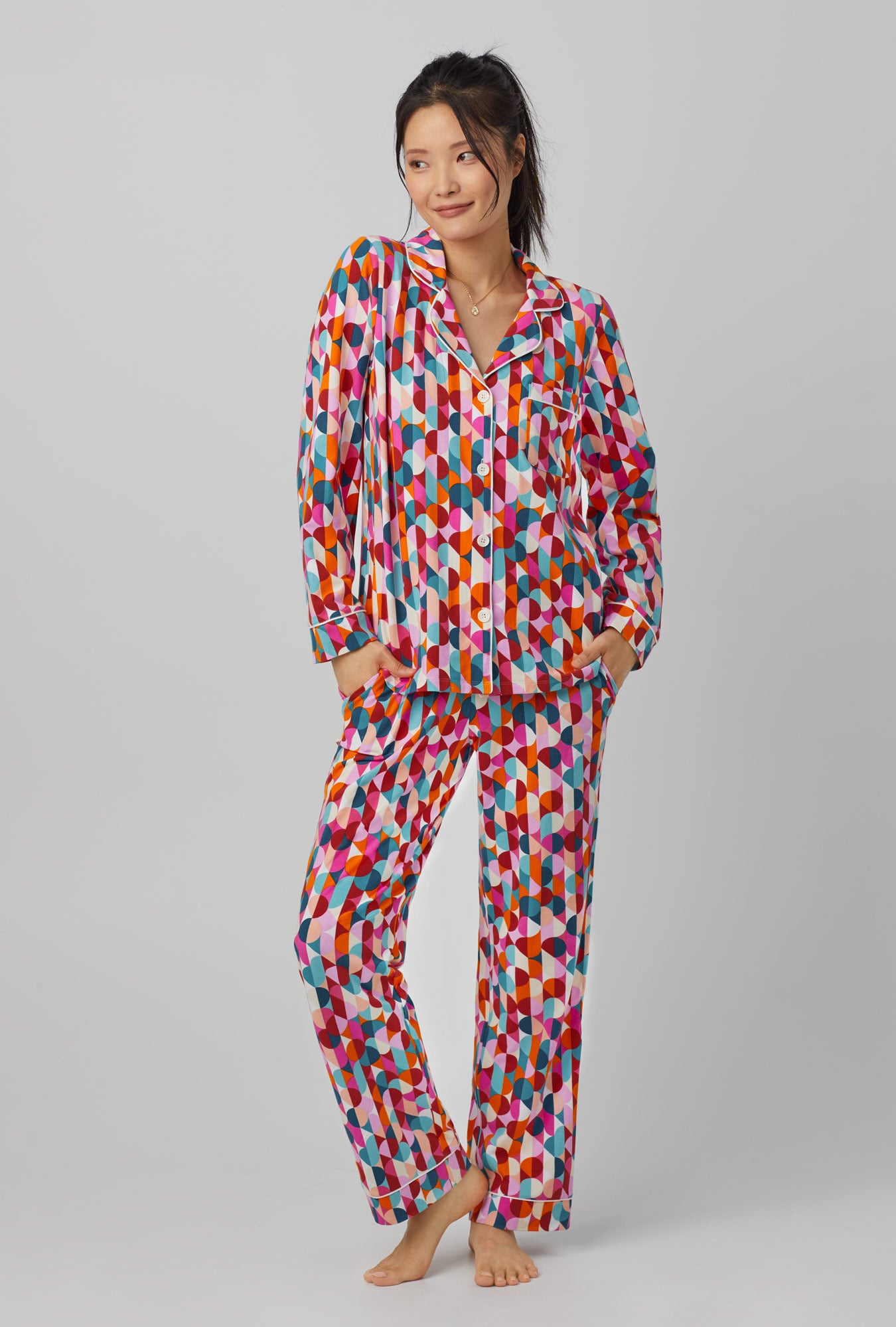 A lady wearing Long Sleeve Classic Stretch Jersey PJ Set with dancing dots print