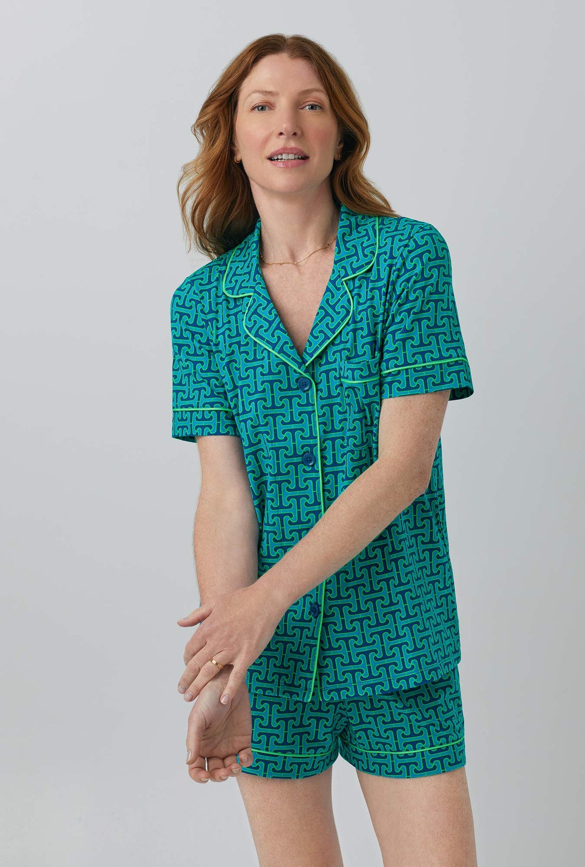 A lady wearing  Short Sleeve Classic Shorty Stretch Jersey PJ Set with Blue Tile  print
