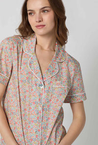 A closeup of A lady wearing Emma & Georgina Short Sleeve Classic Woven Tana Lawn® Cropped Pj Set Made With Liberty Fabric