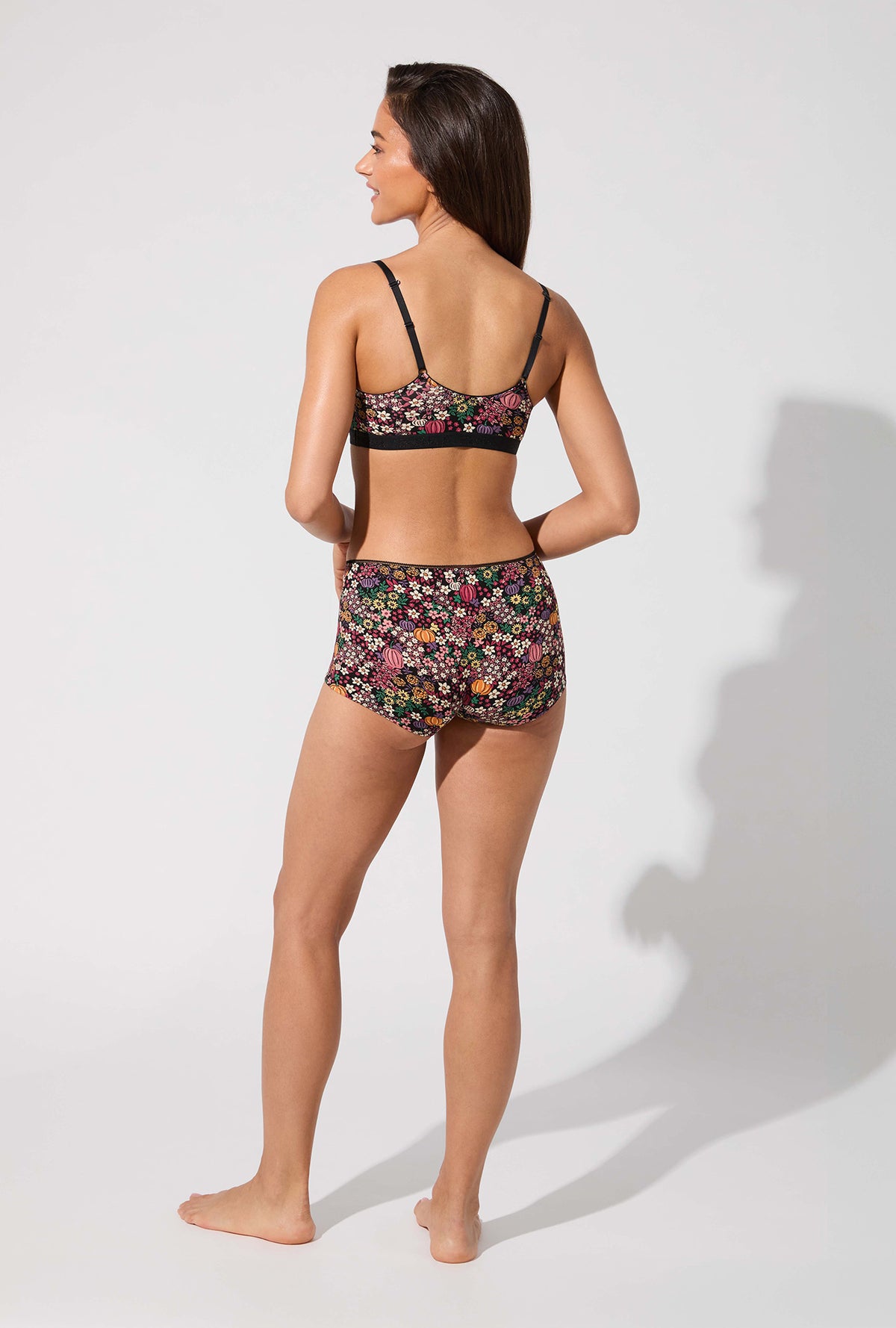 A lady wearing Pumpkin Ditsy Stretch Jersey Bralette