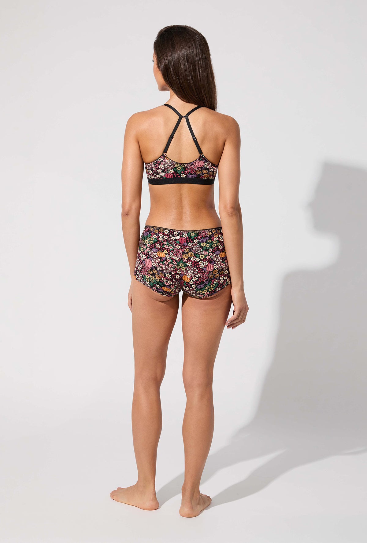 A lady wearing Pumpkin Ditsy Stretch Jersey Bralette
