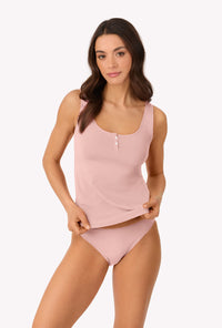 A lady wearing First Blush Stretch Jersey Tank looking side