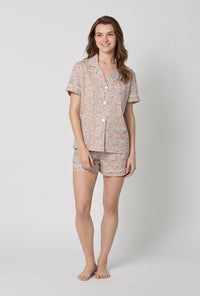 A lady wearing Emma & Georgina Short Sleeve Classic Shorty Woven Tana Lawn® PJ Set Made with Liberty Fabric front view