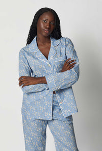 A closeup of A lady wearing Blue Long Sleeve Classic Woven Tana Lawn® Pj Set Made With Liberty Fabric