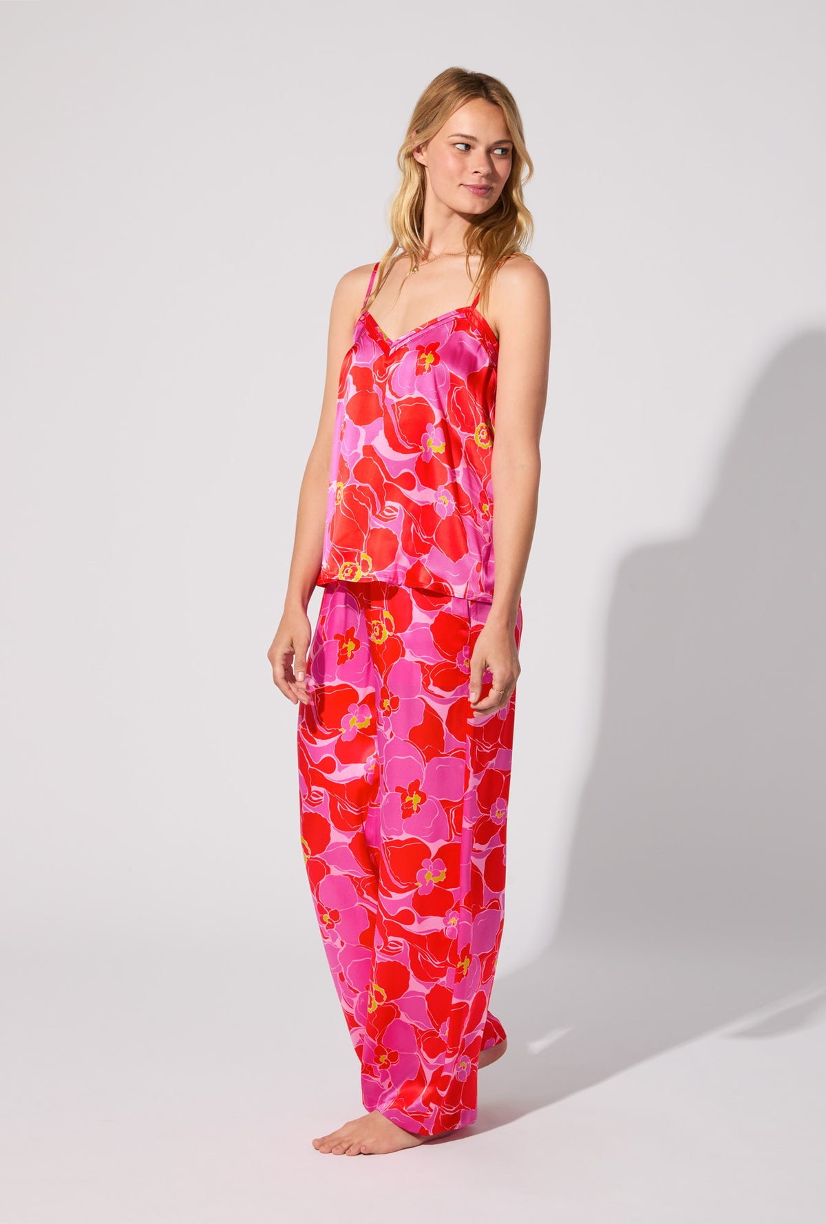 A lady wearing BedHead X Trina Turk Winter Orchids Cami Tank Woven Washable Silk Long PJ Set