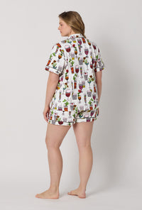 A lady wearing plus size  White Short Sleeve Classic Shorty Stretch Jersey Pj Set back view