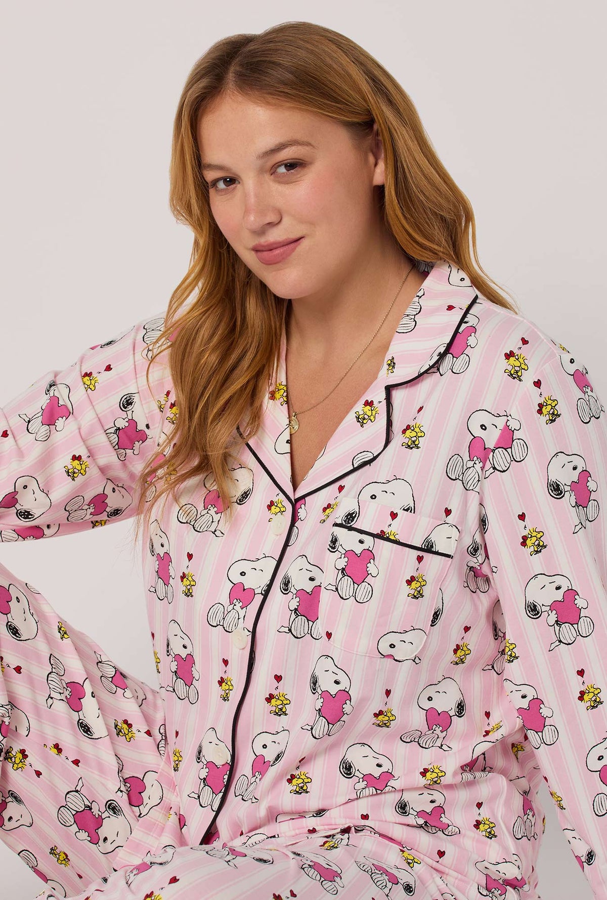 A lady wearing Snoopy's Valentine Long Sleeve Classic Stretch Jersey Pj Set