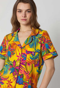 A closeup of A lady wearing  Yellow Short Sleeve Classic Shorty Stretch Jersey Pj Set