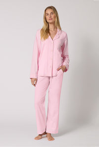 A lady wearing Pink Powder Long Sleeve Classic Stretch Jersey Pj Set looking front