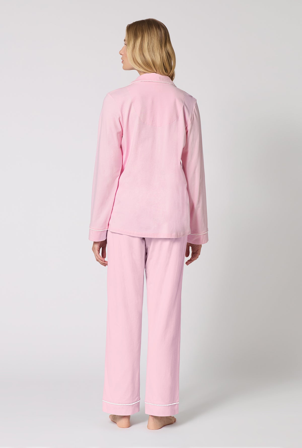 A lady wearing Pink Powder Long Sleeve Classic Stretch Jersey Pj Set back view