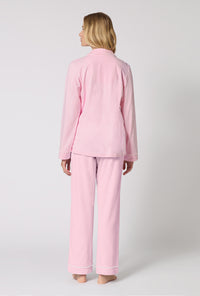 A lady wearing Pink Powder Long Sleeve Classic Stretch Jersey Pj Set back view