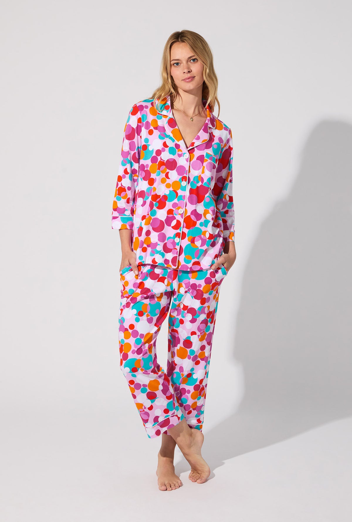 A lady wearing BedHead X Trina Turk Bubble Dots 3/4 Sleeve Classic Stretch Jersey Cropped PJ Set