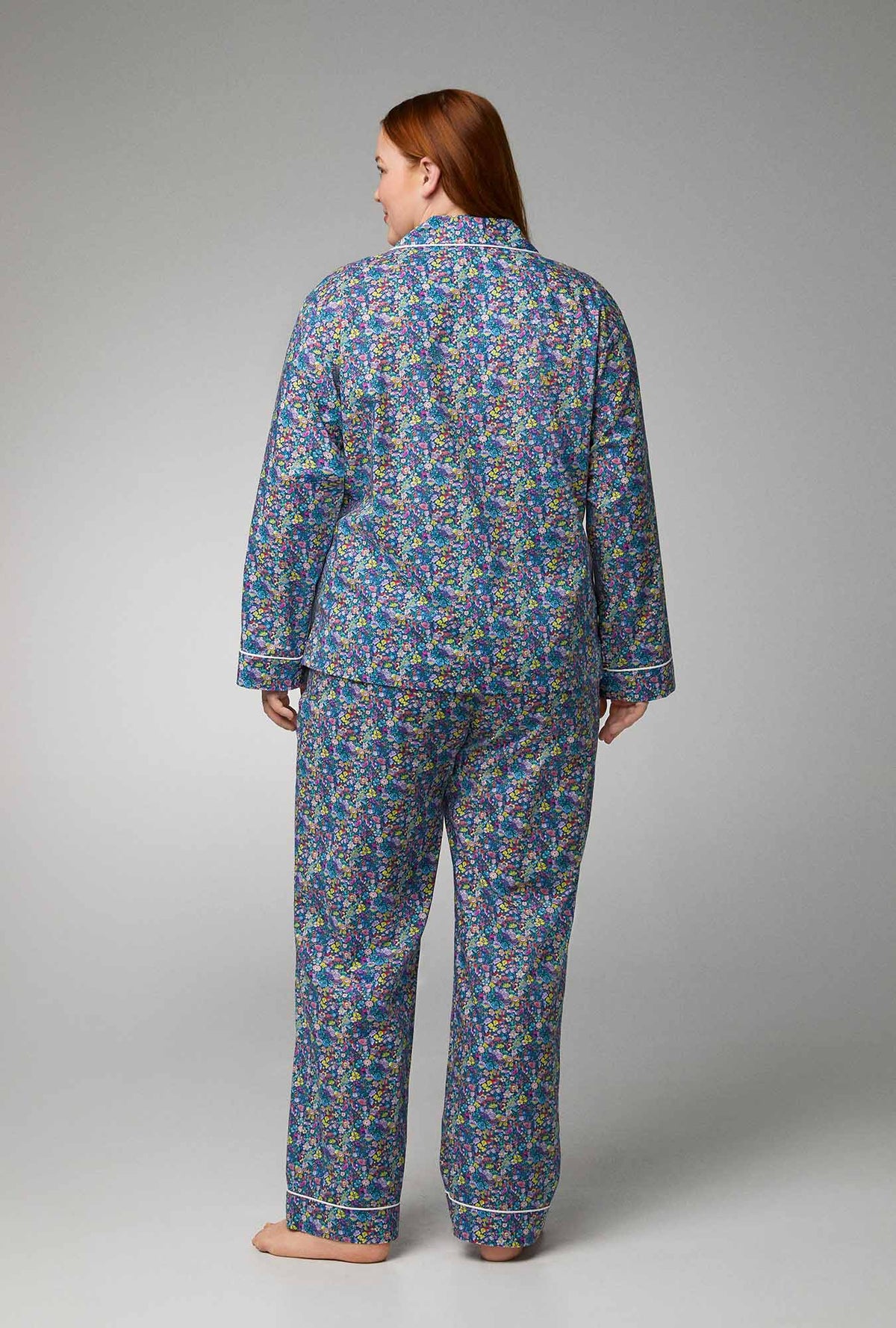 A lady wearing long sleeve classic cotton pj set with classic garden print