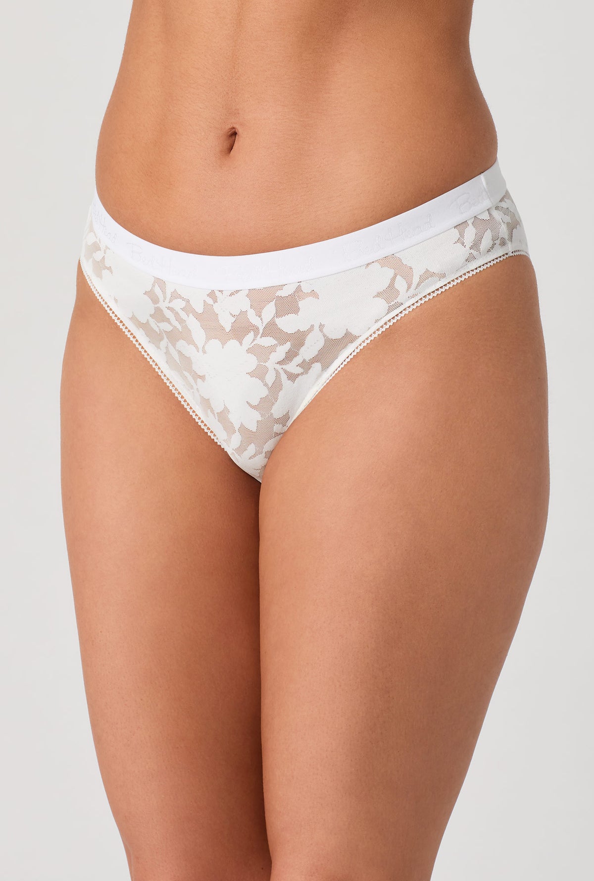 A lady wearing White Stretch Lace Bikini Underwear