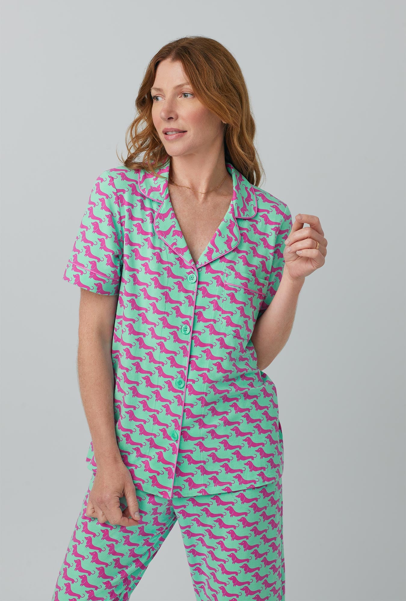 A lady wearing  Short Sleeve Classic Stretch Jersey Cropped PJ Set with Dog Walk  print