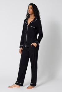 A lady wearing Black Beauty Long Sleeve Classic Stretch Jersey Pj Set looking side