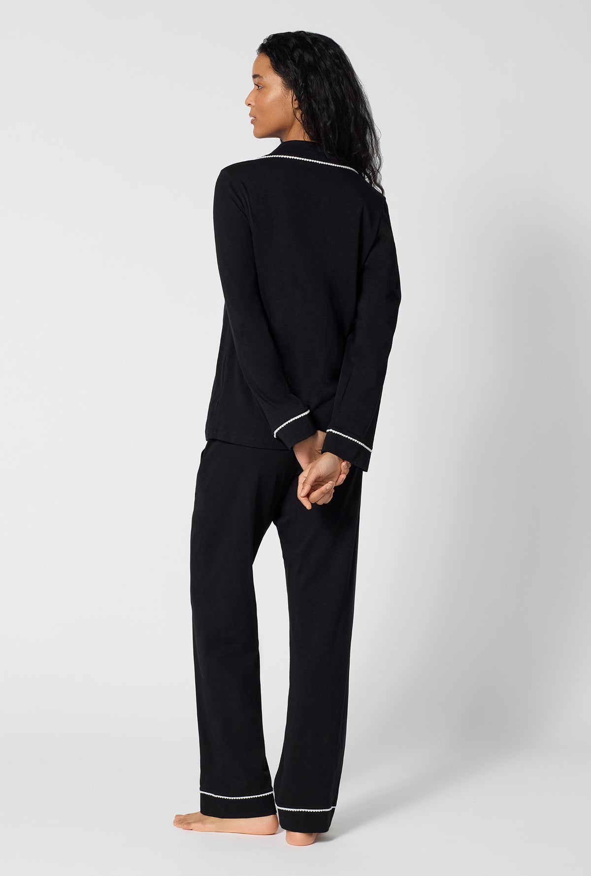 A lady wearing Black Beauty Long Sleeve Classic Stretch Jersey Pj Set back view